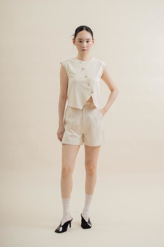 Diagonal Cut Button Sleeveless Top (Beige)