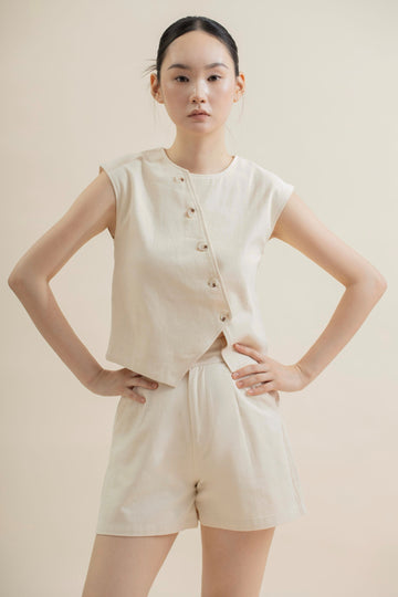Diagonal Cut Button Sleeveless Top (Beige)