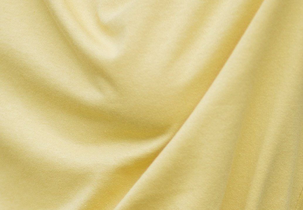 Soft botanical yellow cotton drape