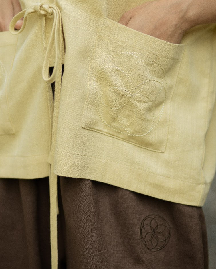 Seed of Life embroidery on a SHOPLOOOH Re Collection pocket and trouser