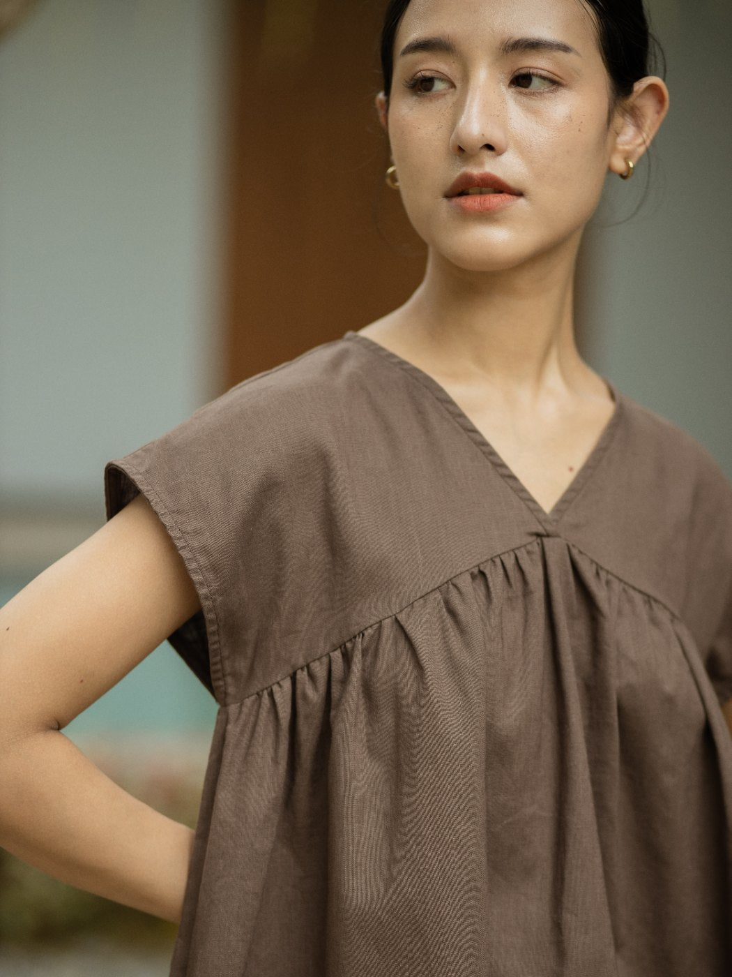 The SHOPLOOOH Re Collection warm brown cotton-linen top, worn