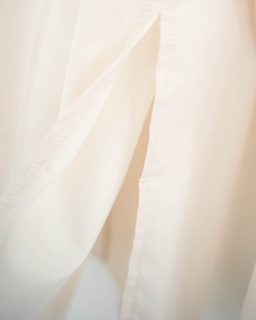 Ava Multi-Wear Shirt (Cream)_Side slit